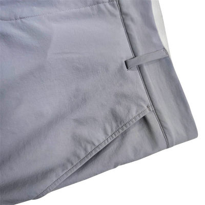 Il golf di allungamento di stile del pareggiatore ansima i pantaloni wicking del golf dell'umidità asciutta rapida della cintura degli uomini